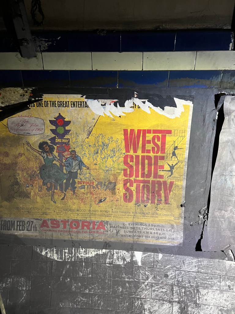 A damaged and dirty poster for West Side Story.
